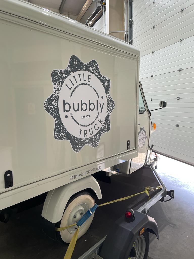 Van/truck with logo branding graphics on the side